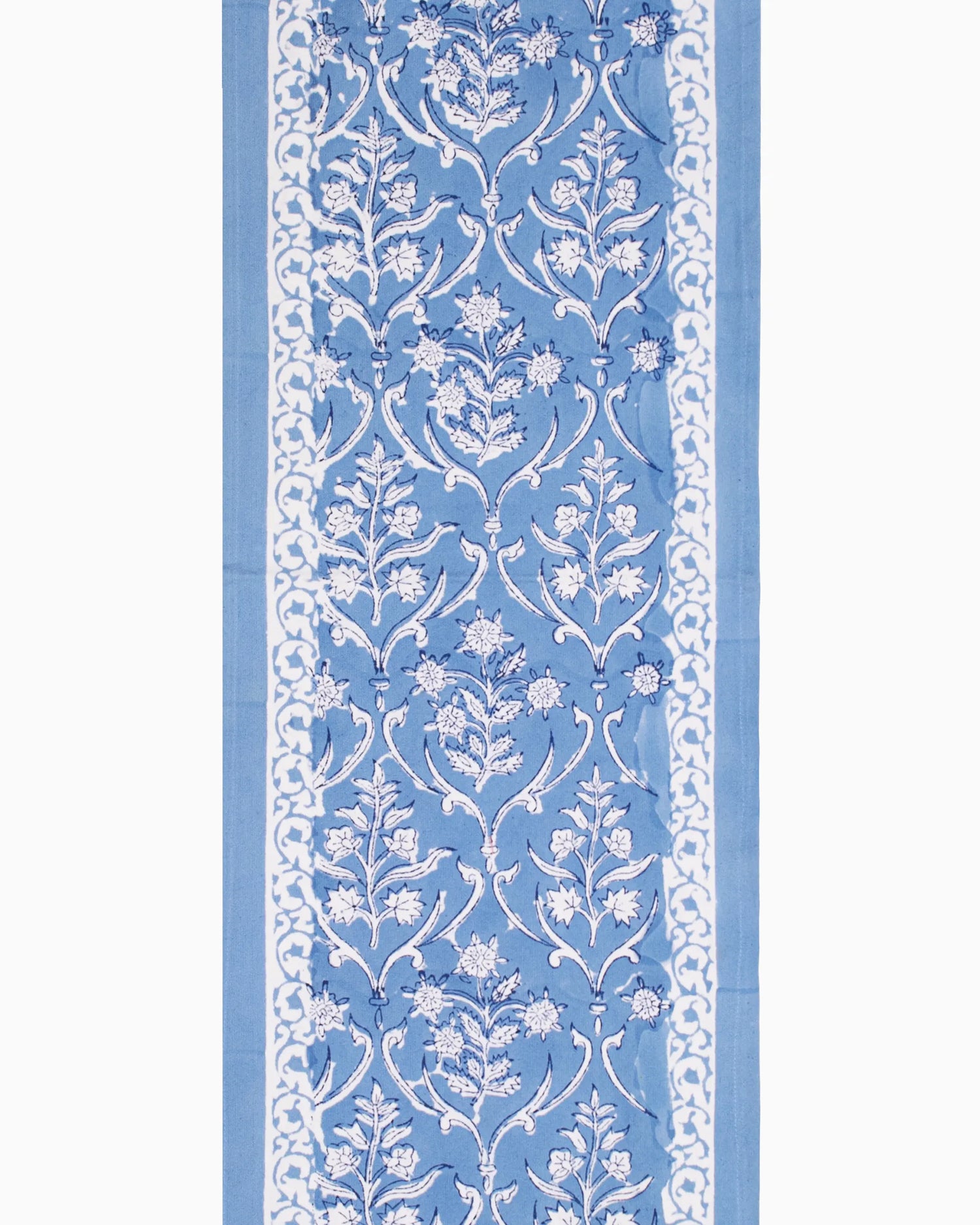 A beautiful blue color table runner, with an elegant white patterns. An essential table accessory that adds charm your home decor effortlessly.