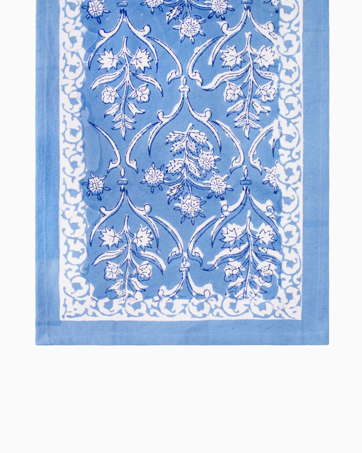 A beautiful blue color table runner, with an elegant white patterns. An essential table accessory that adds charm your home decor effortlessly.