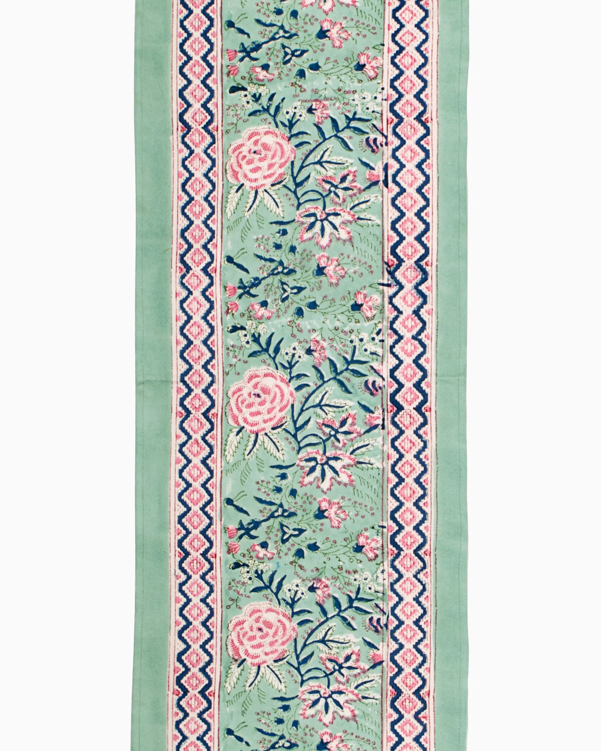 A beautiful green color table runner, with an elegant pink floral patterns. An essential table accessory that adds charm your home decor effortlessly.